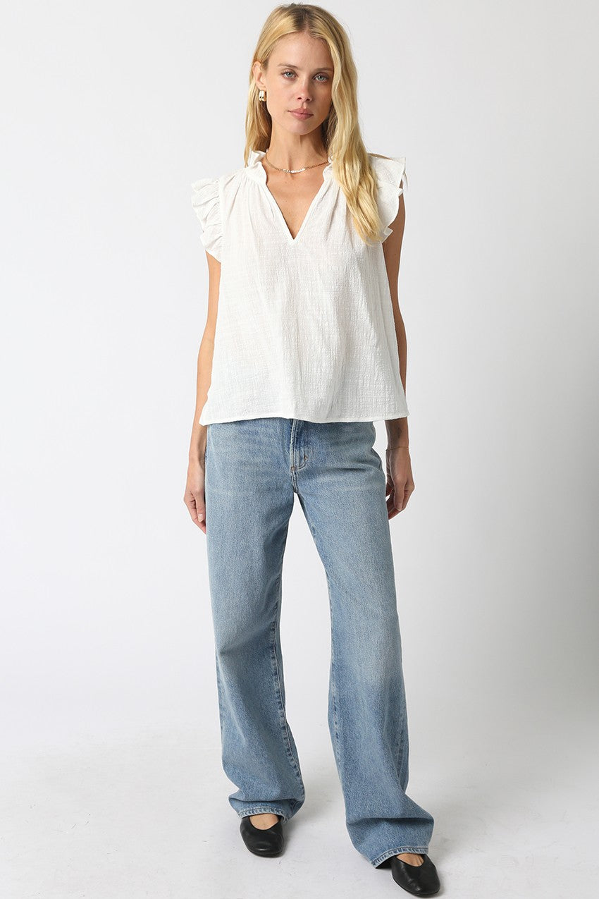 Women’s cotton blouse with ruffled cap sleeves