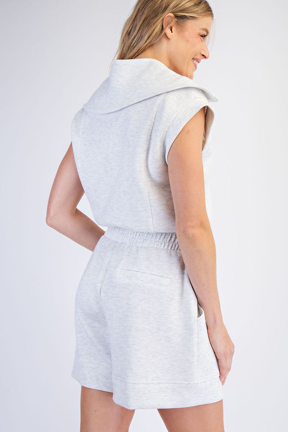 Lightweight modal blend romper with dropped armholes and diagonal pockets