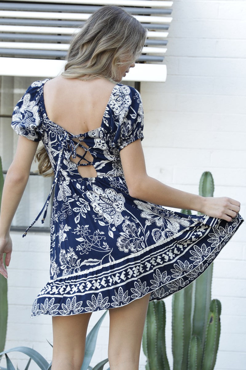  SHORT SLEEVE DRESS W A SMOCK TOP AND TIE UP BACK