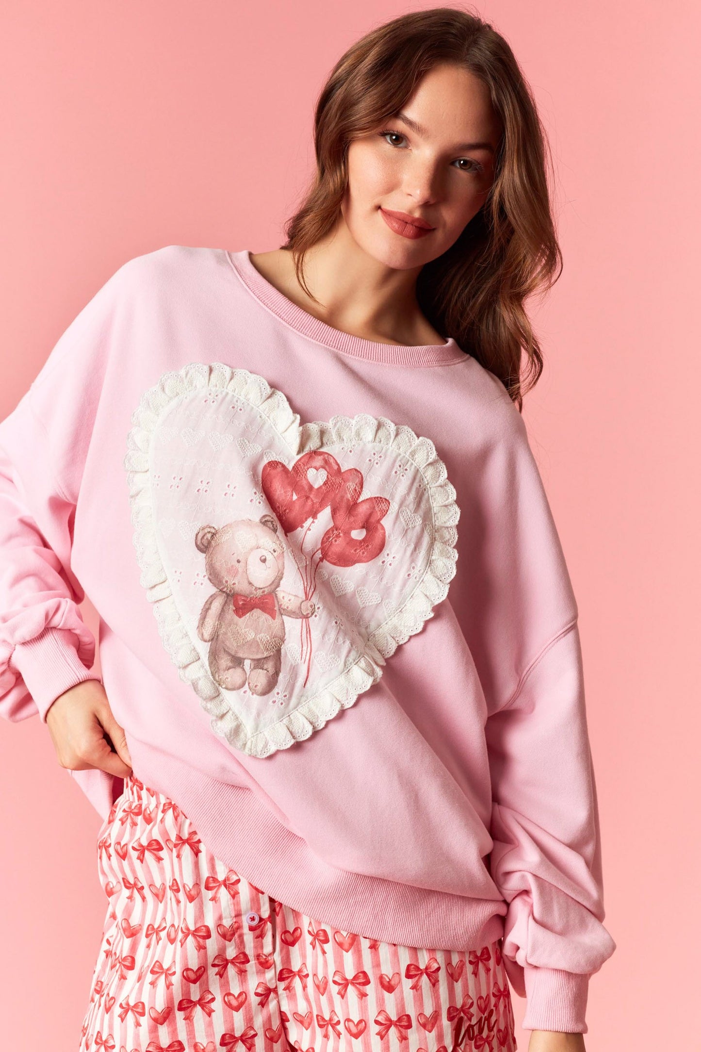 Valentine bear printed sweatshirt with heart-shaped eyelet patches
