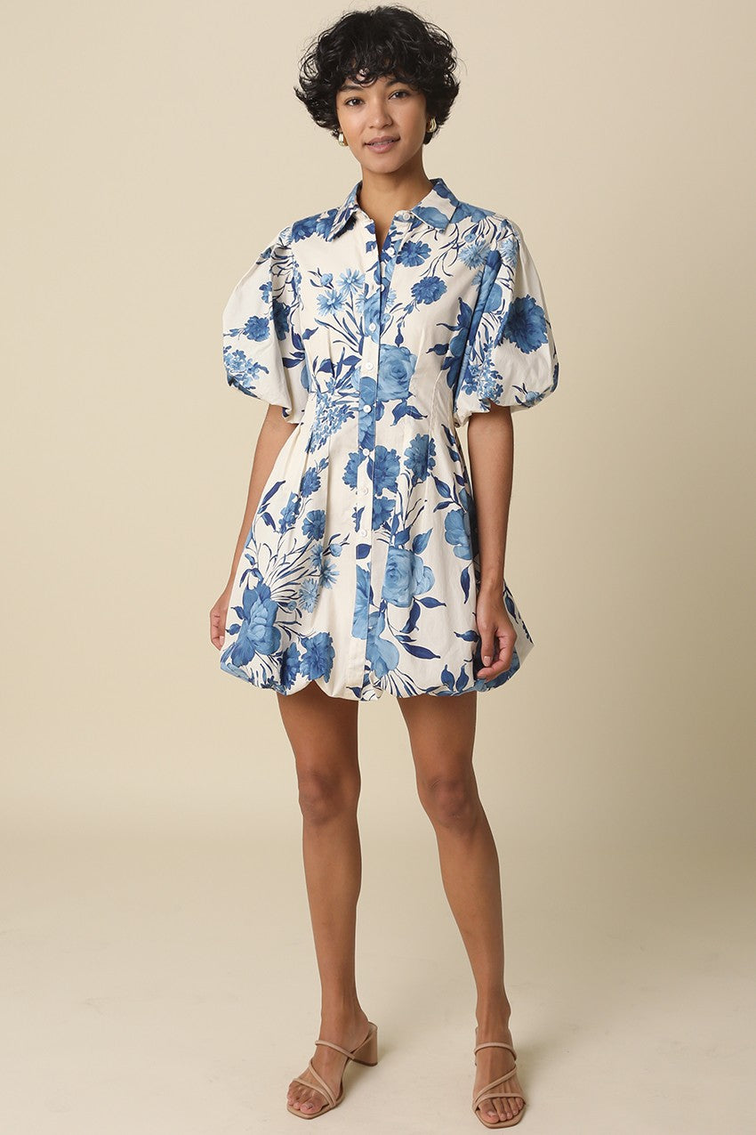 Floral bubble dress with pointed collar, short sleeves, and voluminous flared hem