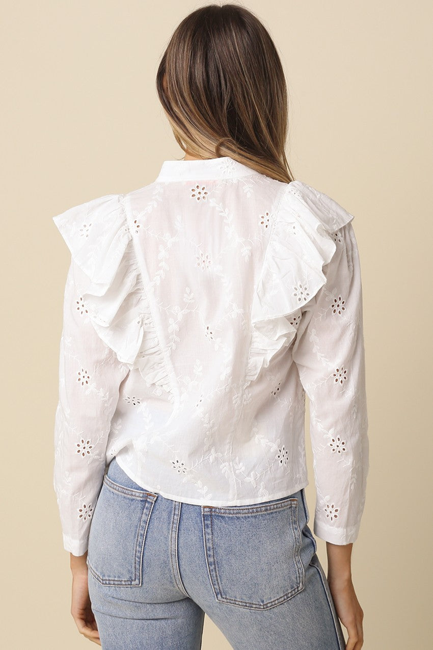 Women’s cotton eyelet blouse with oversized front ruffle and button front