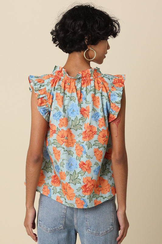 light blue floral ruffle-sleeve women’s top with orange and blue flowers, relaxed fit, and V-neckline