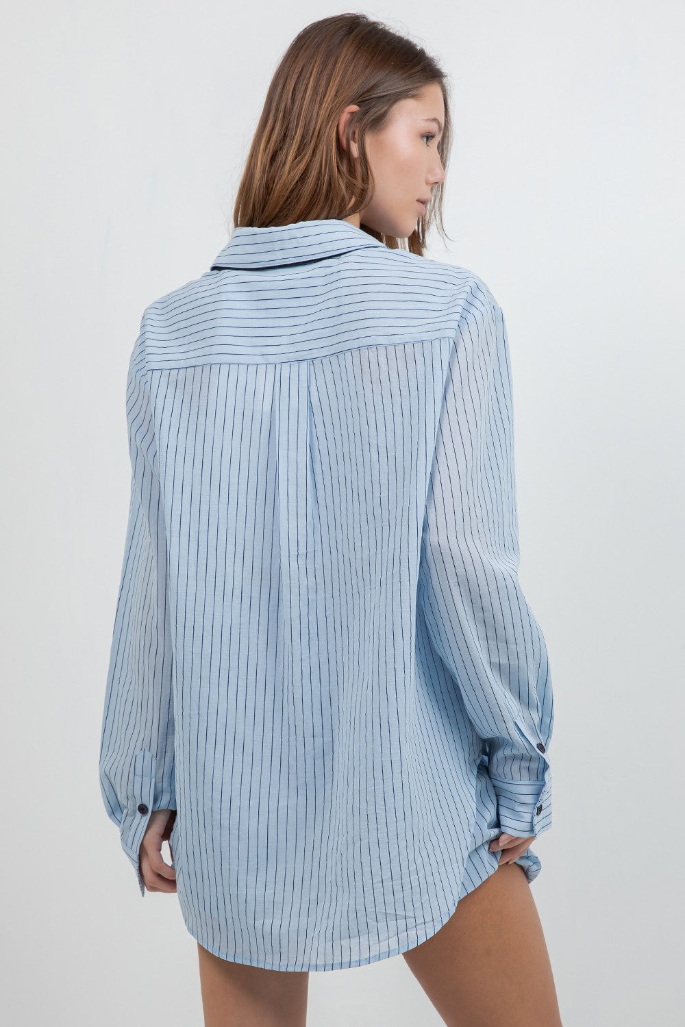  Pinstripe Shirt combines classic sophistication with a detachable contrast neck 