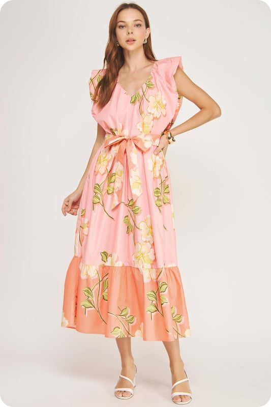 V-neck tropical hibiscus midi dress with ruffle sleeves, a tiered skirt, and a removable sash belt