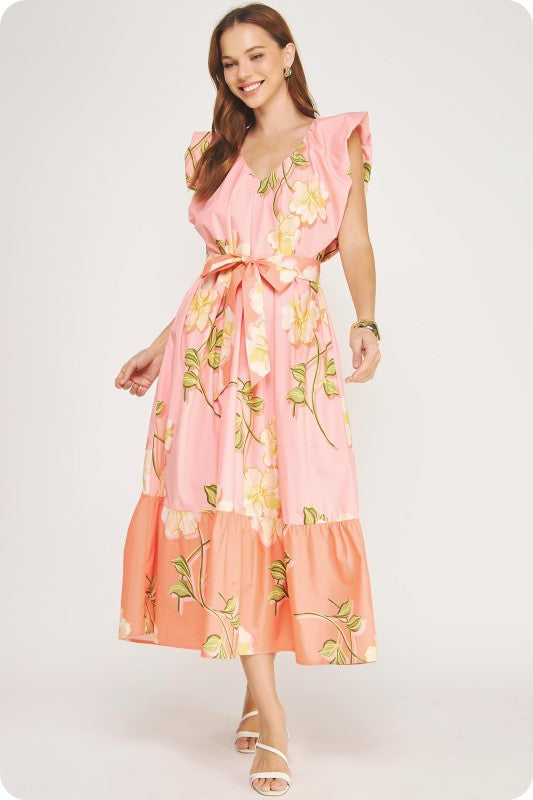 V-neck tropical hibiscus midi dress with ruffle sleeves, a tiered skirt, and a removable sash belt