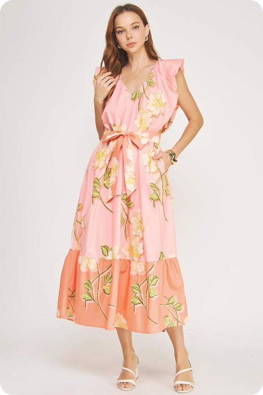 V-neck tropical hibiscus midi dress with ruffle sleeves, a tiered skirt, and a removable sash belt