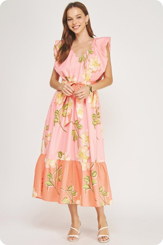 V-neck tropical hibiscus midi dress with ruffle sleeves, a tiered skirt, and a removable sash belt