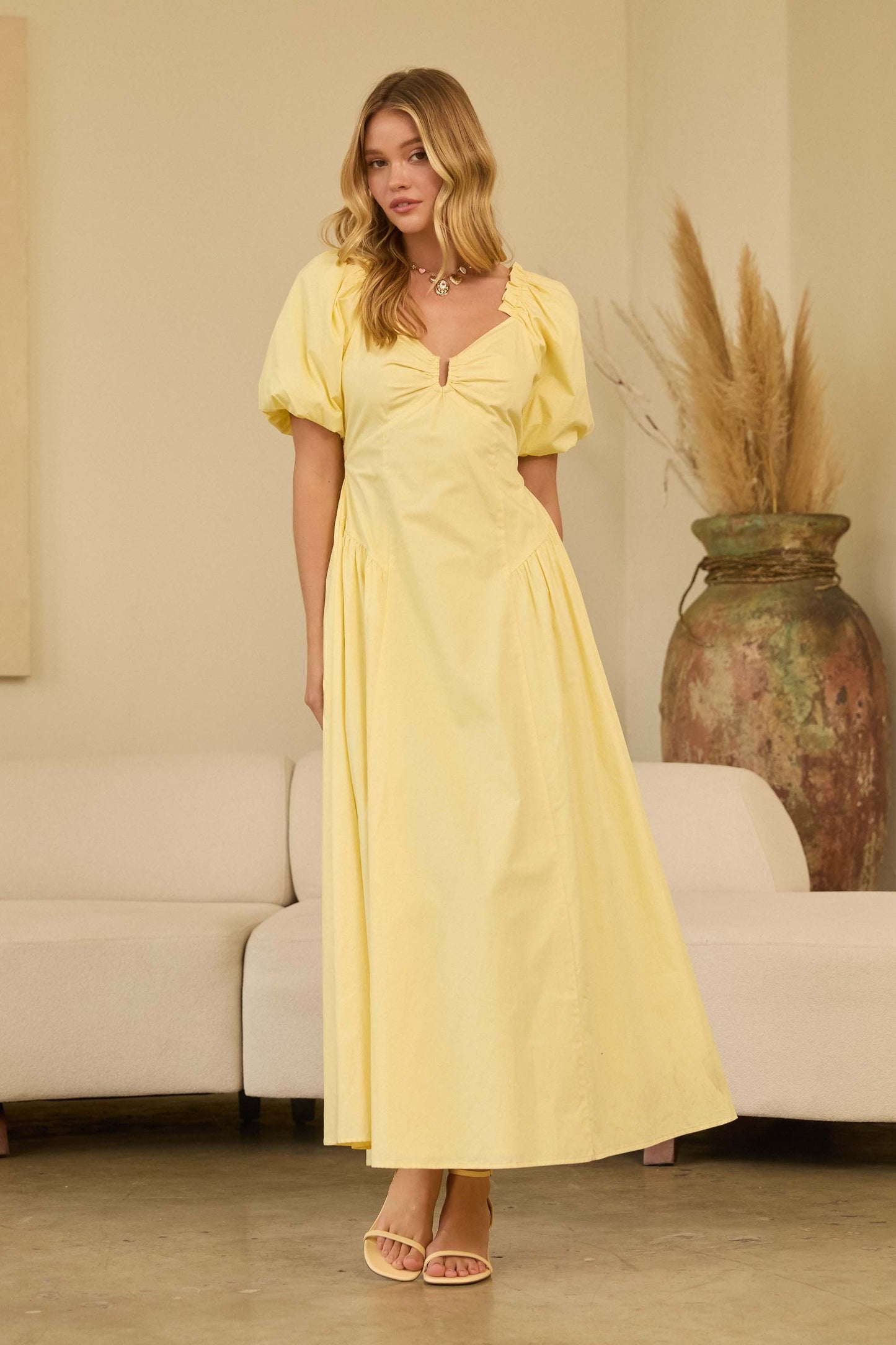 Bubble sleeve maxi dress with flowy silhouette for spring occasions