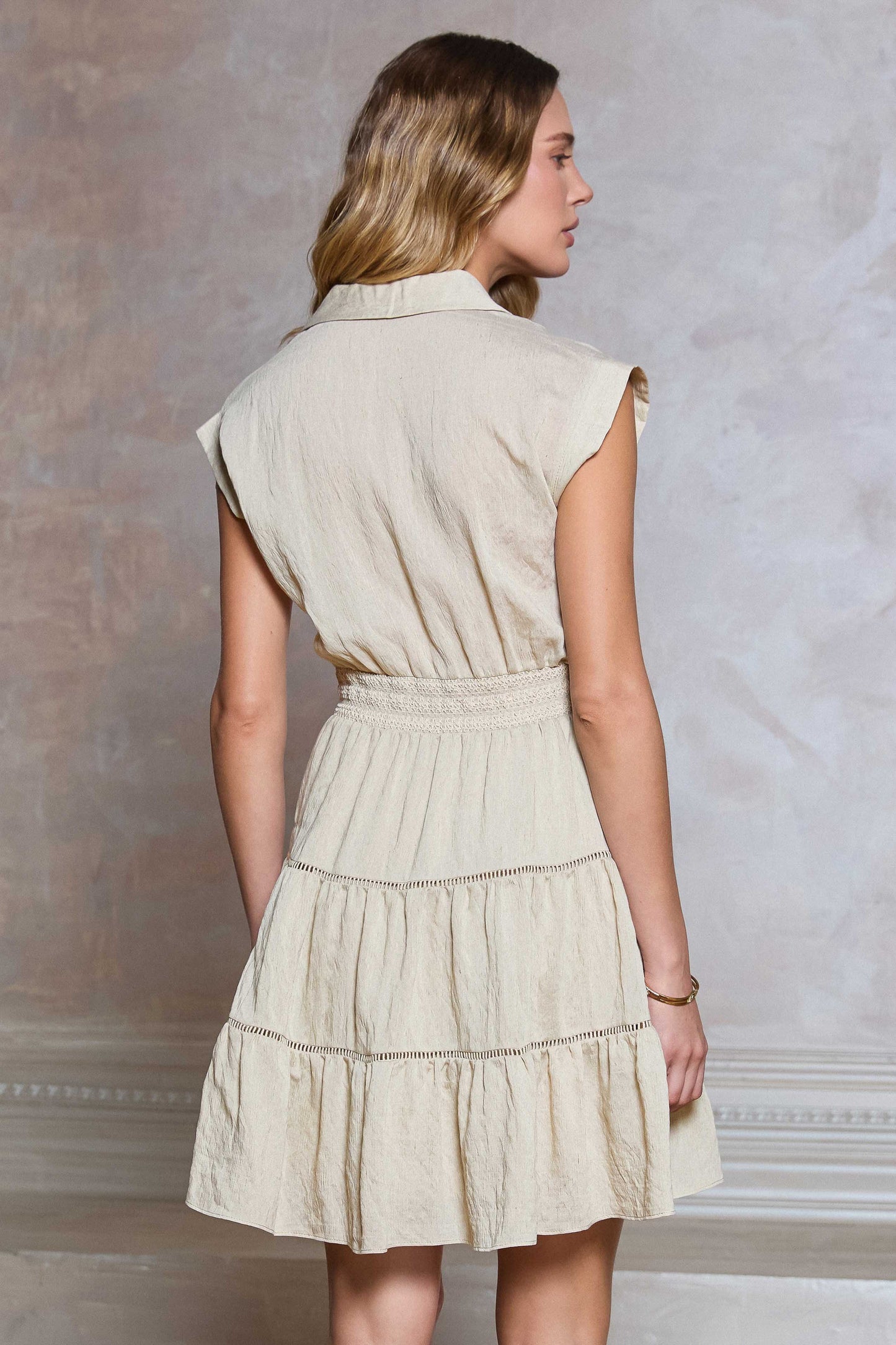 Tiered Mini Dress features a shirt collar, cap sleeves, and a tiered lace-trim skirt in lightweight textured fabric