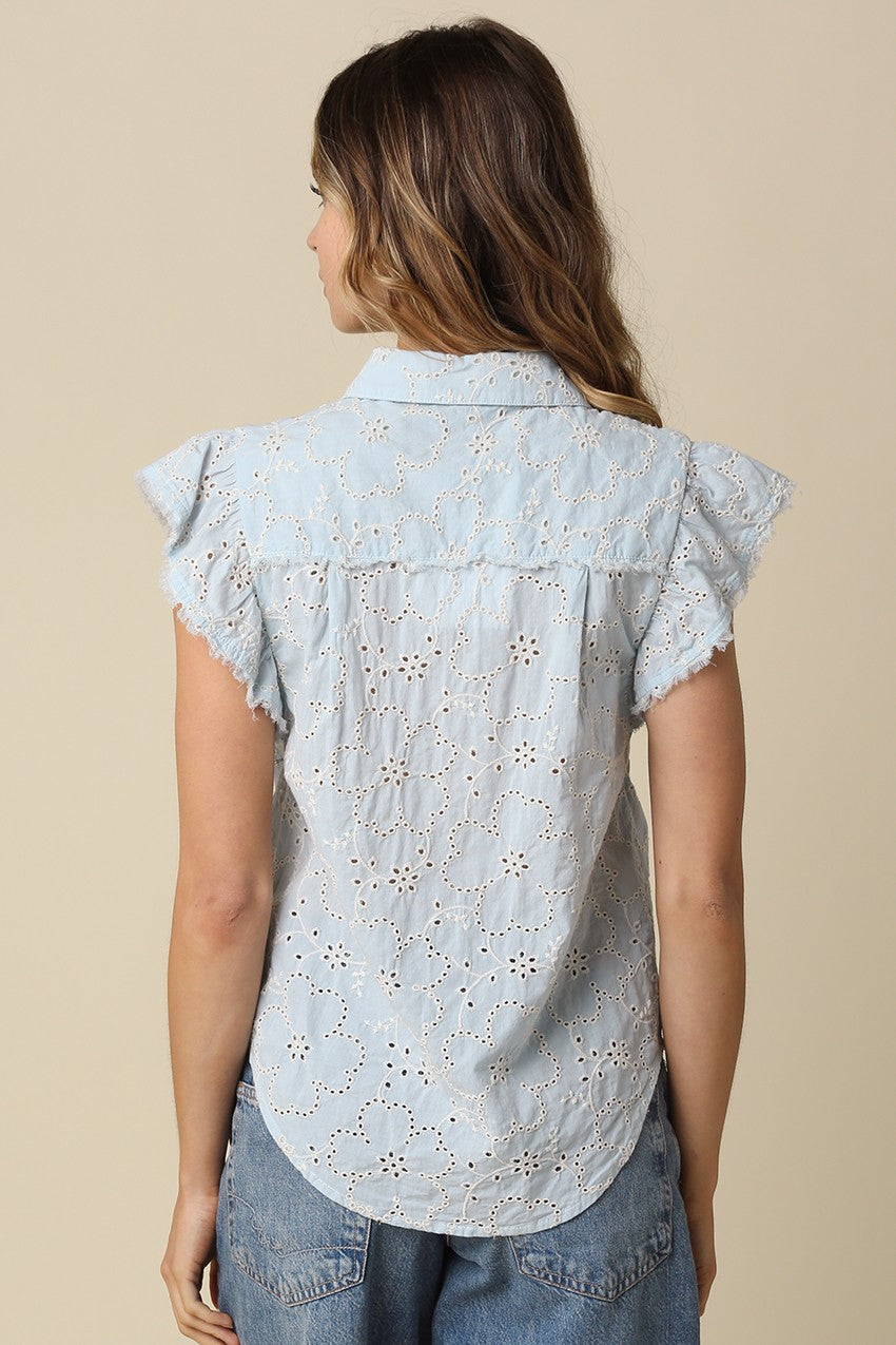 Anne pintuck flutter sleeve top featuring vertical pintuck detail, front button closure, and soft cap sleeves.