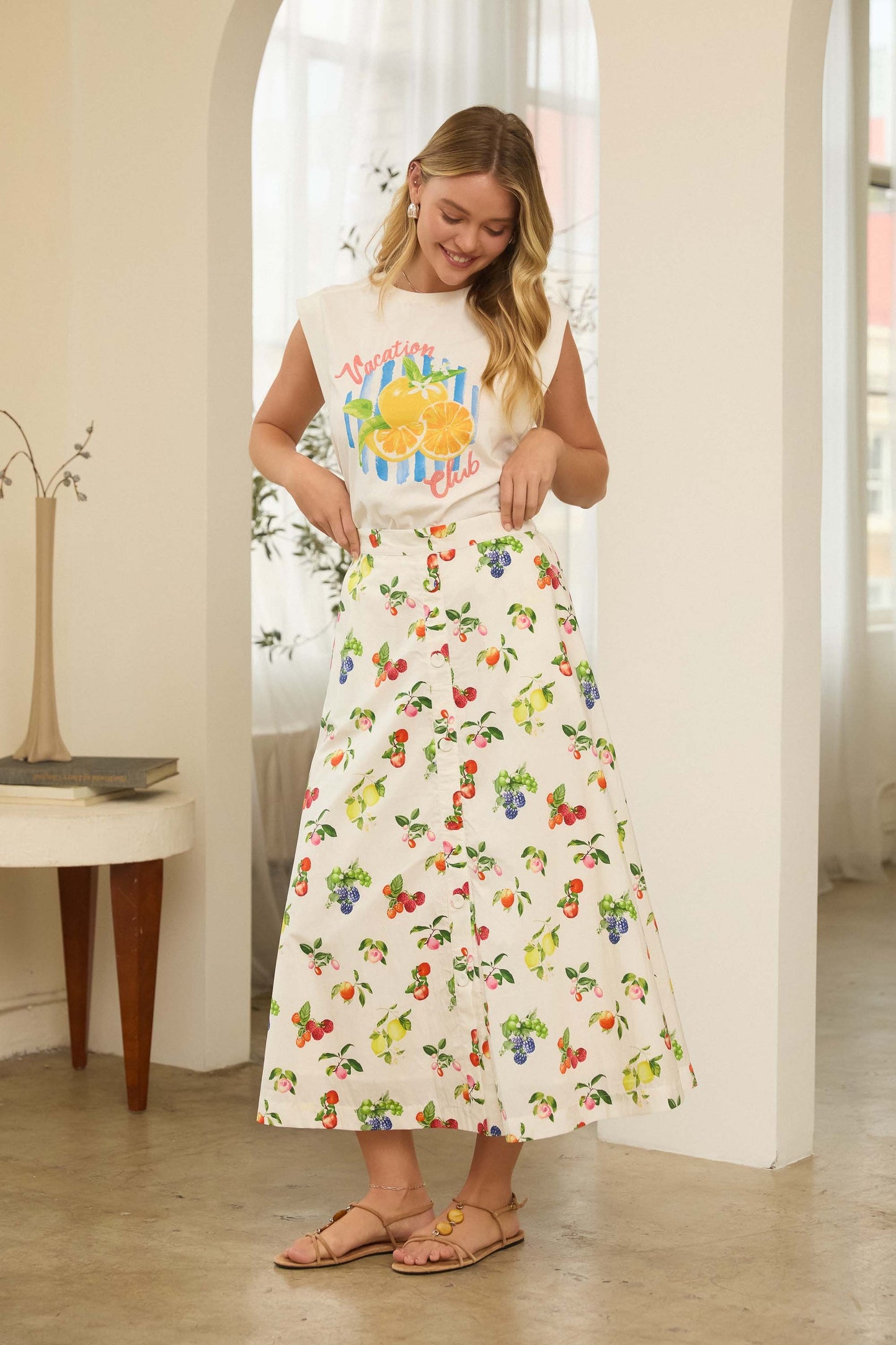Fruit print button-front midi skirt with A-line silhouette