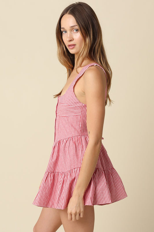 striped cotton romper featuring a square neckline, button-front bodice, and tiered flared shorts