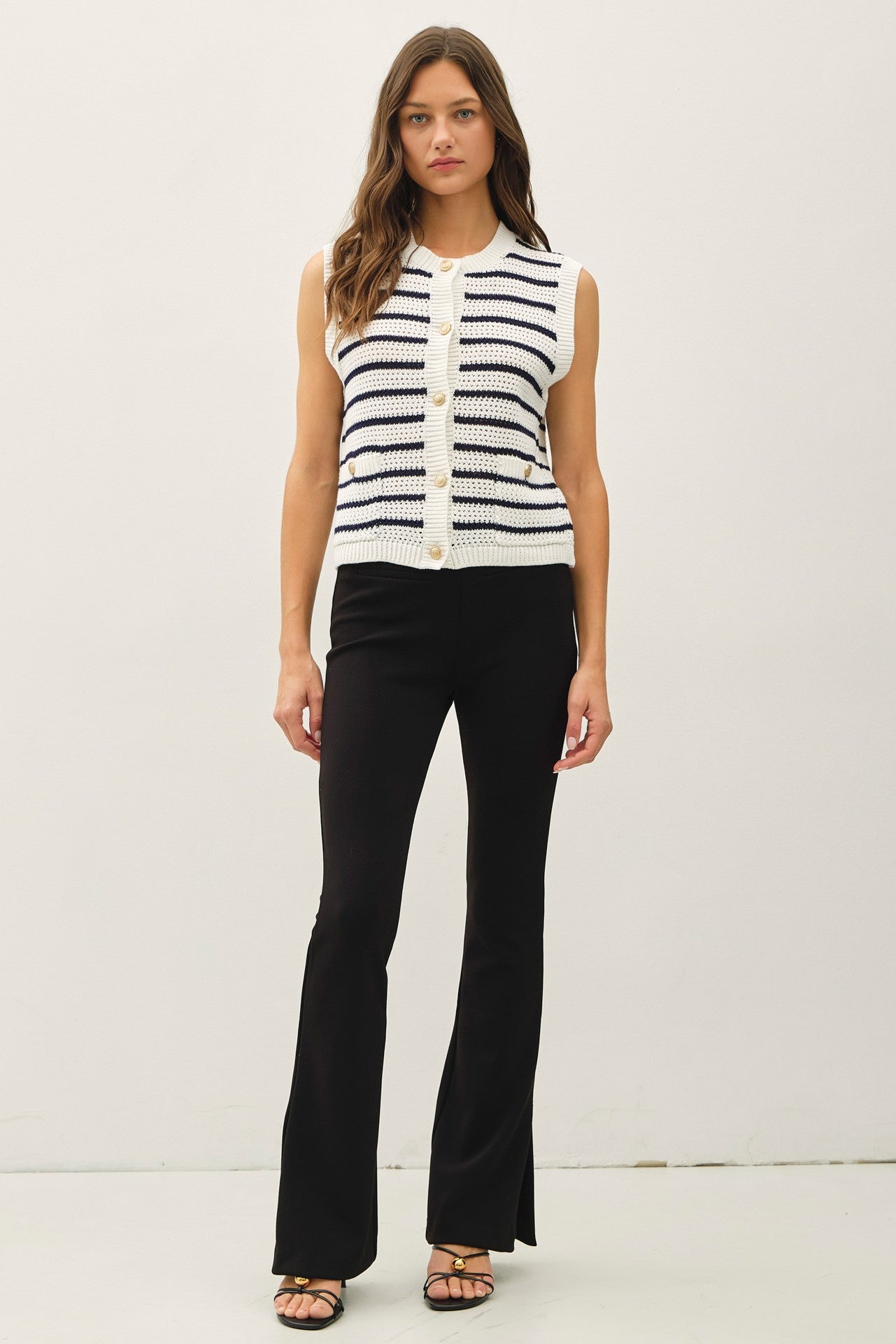 Waffle knit sweater vest with gold buttons
