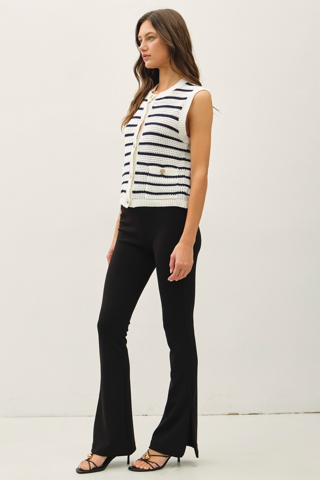 Waffle knit sweater vest with gold buttons