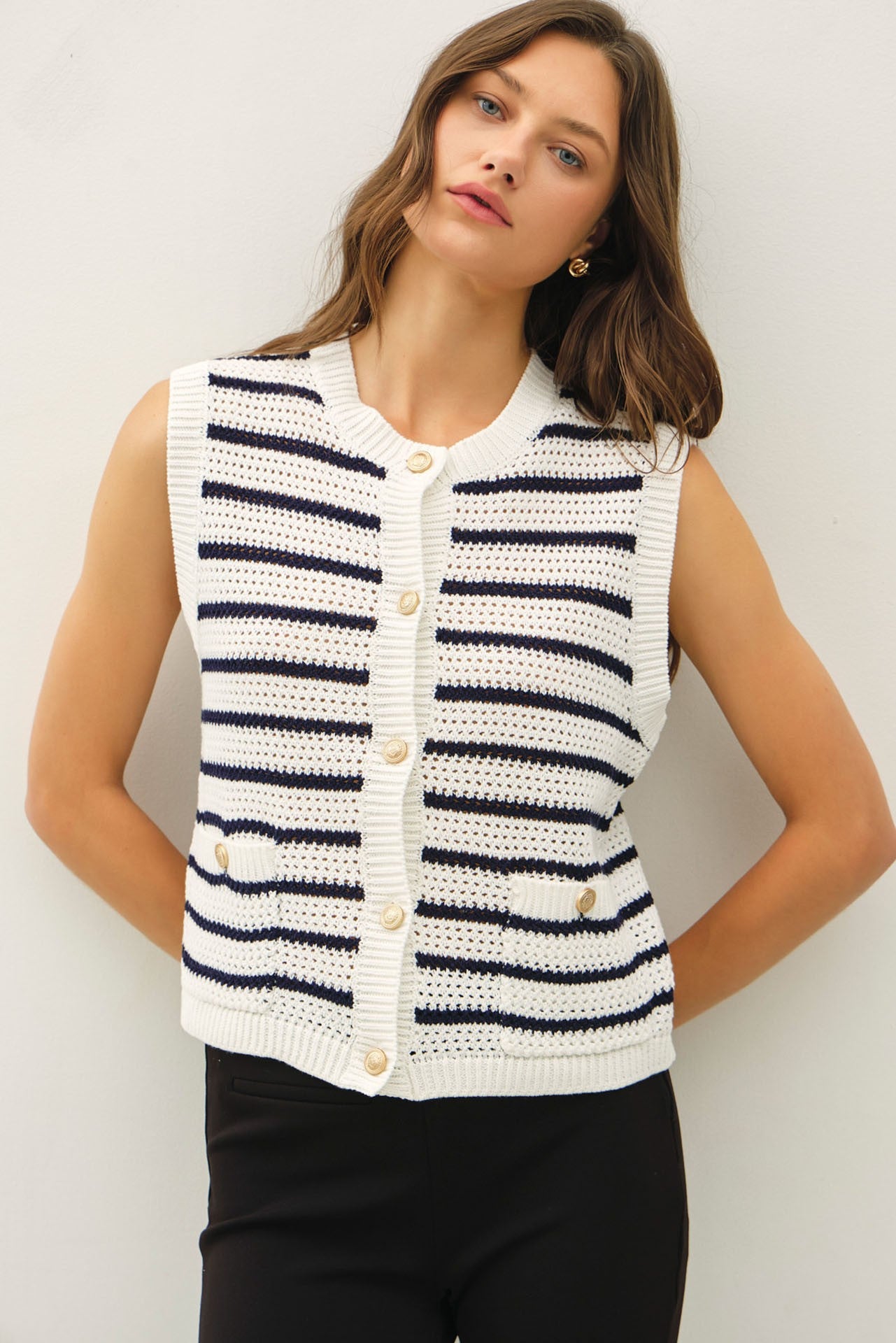 Waffle knit sweater vest with gold buttons