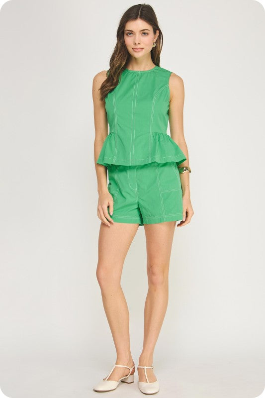 sleeveless cotton-modal poplin top with contrast top-stitching, cinched side waist, hidden zipper, and flared peplum hem