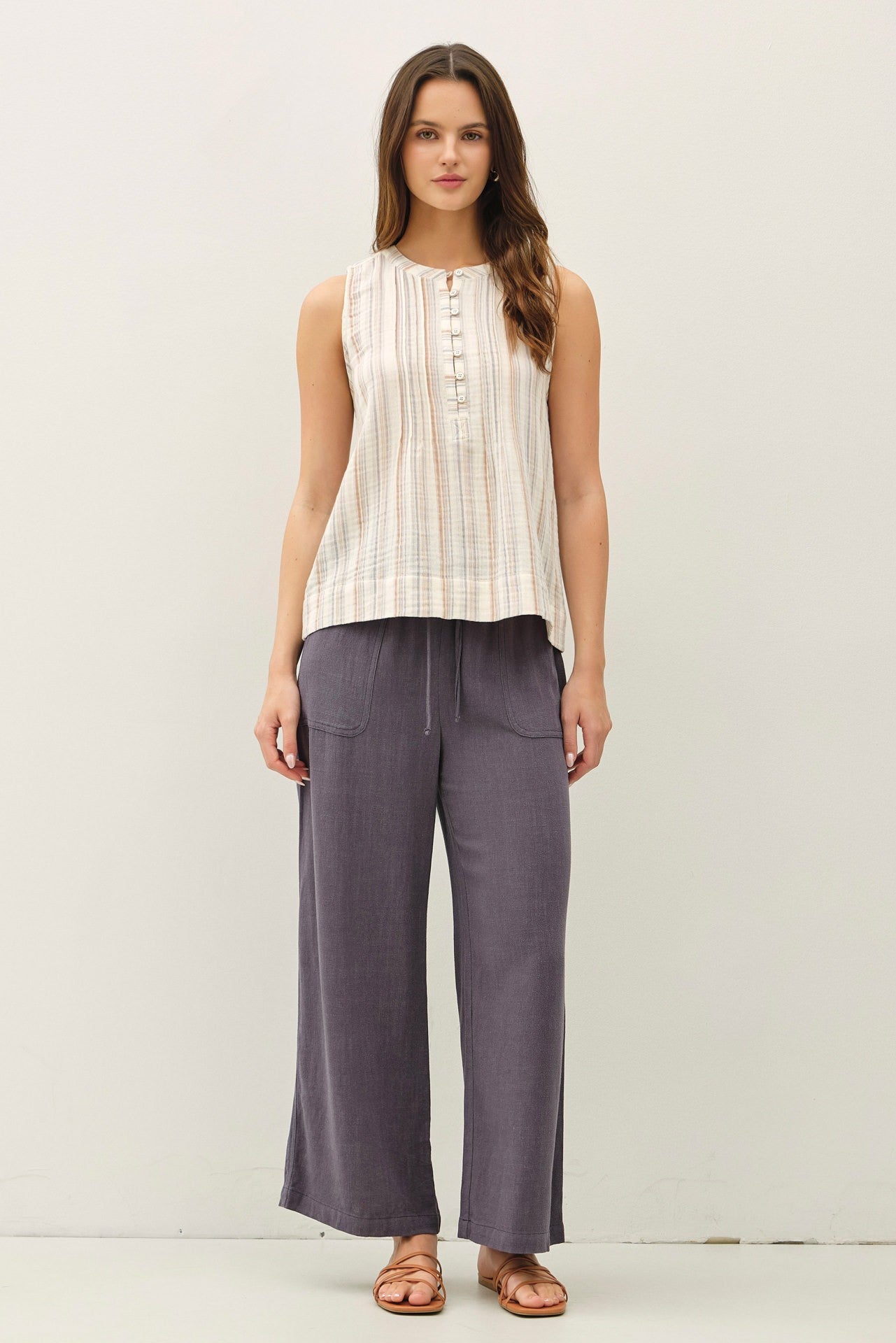  lightweight striped gauze tank with a mandarin collar and half-button Henley neckline 