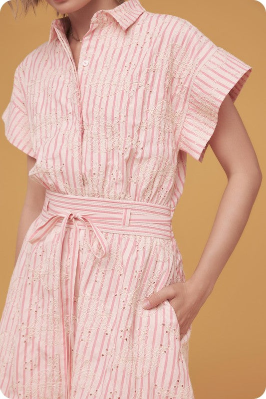 striped mini shirt dress with embroidered eyelet details, a cinched waist, and a relaxed A-line skirt