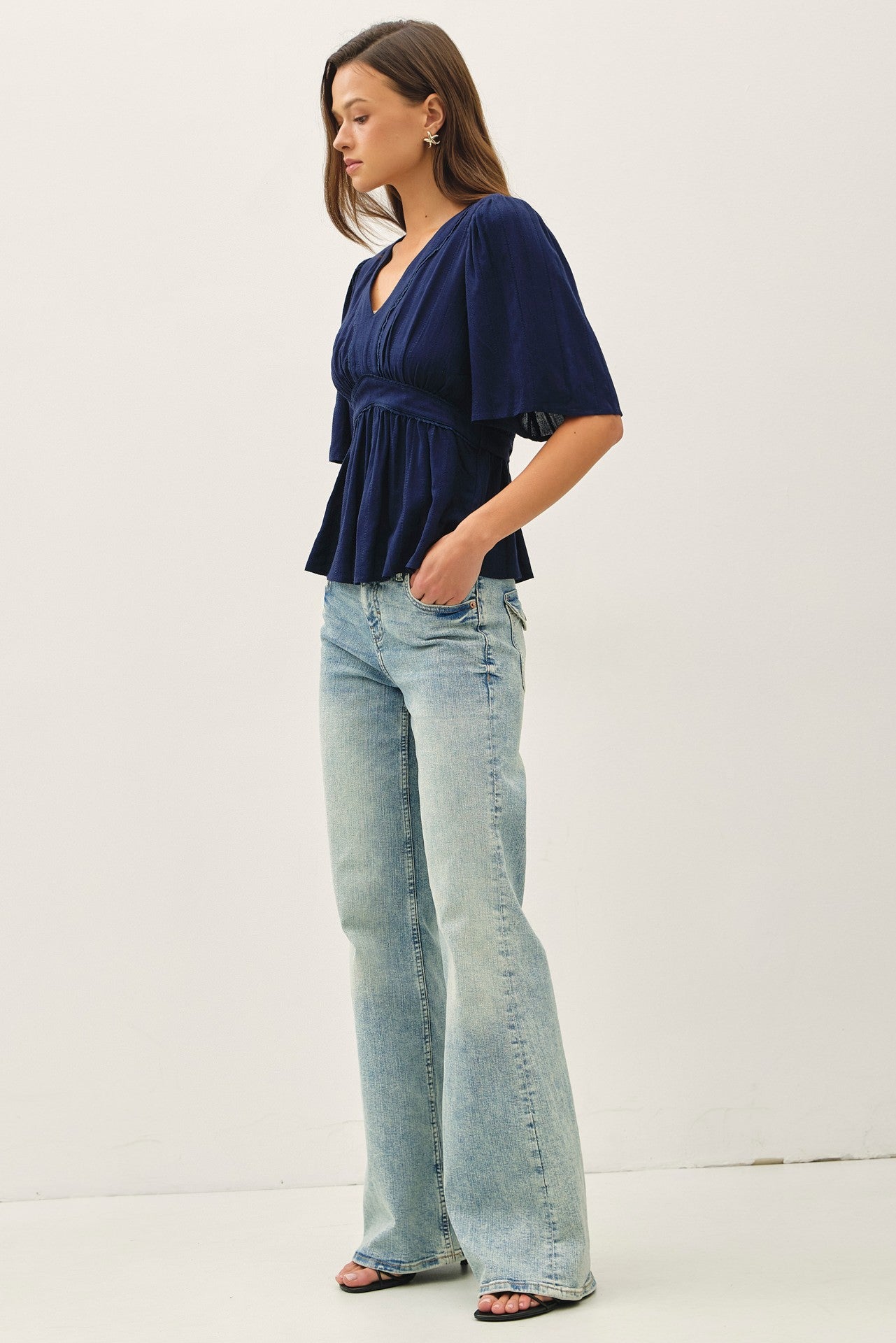 Navy kimono sleeve blouse with a flattering empire waist 