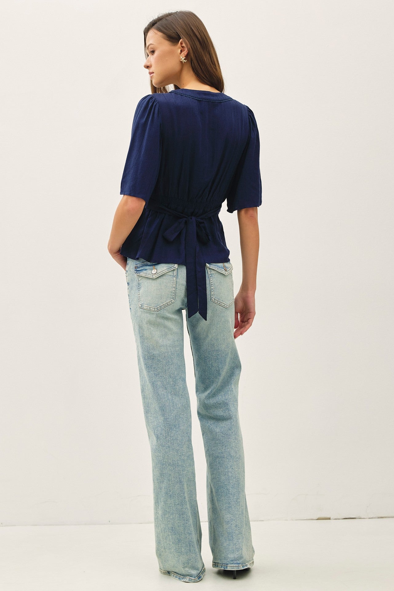 Navy kimono sleeve blouse with a flattering empire waist 