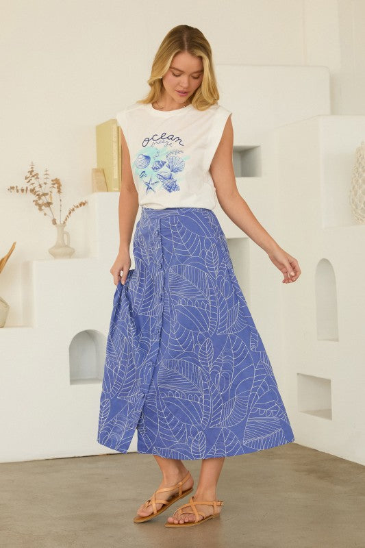  Printed Poplin Midi Skirt features a flattering A-line silhouette and full button-front design 