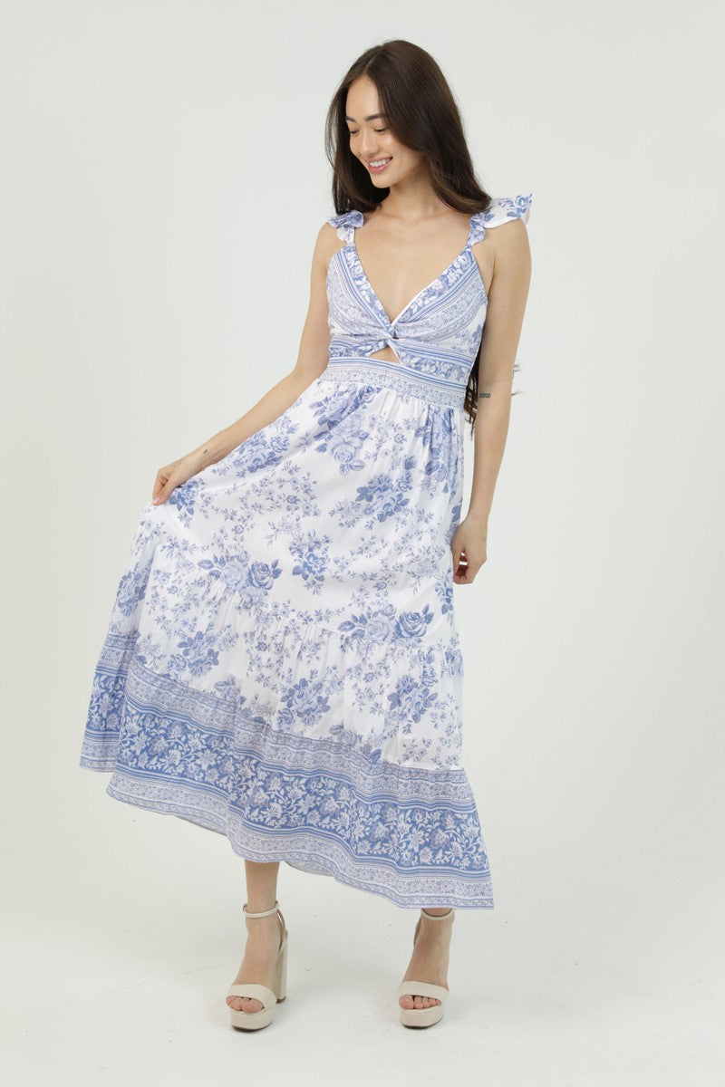 white and blue dress with ruffle straps, a lace-up back, and a playful cutout detail