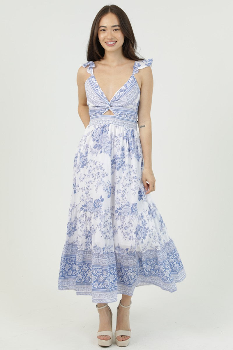 white and blue dress with ruffle straps, a lace-up back, and a playful cutout detail