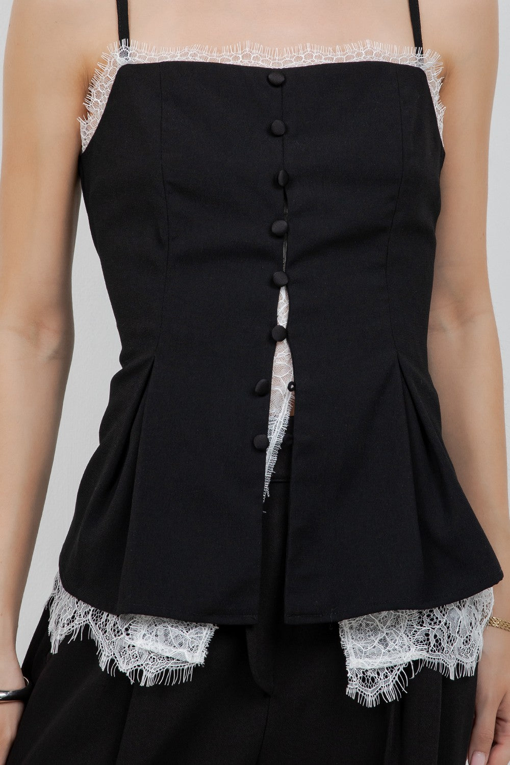 Lace Tank combines a soft woven fabric with a delicate contrast lace insert