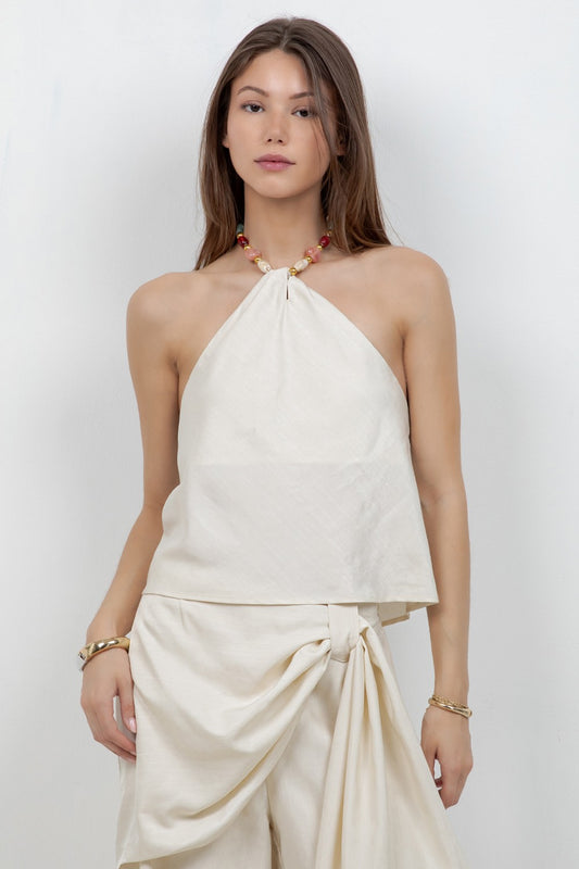 eaded Halter Top features a soft woven fabric with elegant bead accents