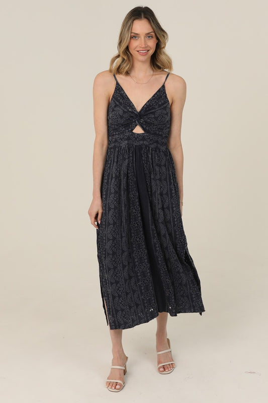  Midi Dress features a twist-front bodice, cutout detail, and eyelet embroidery 