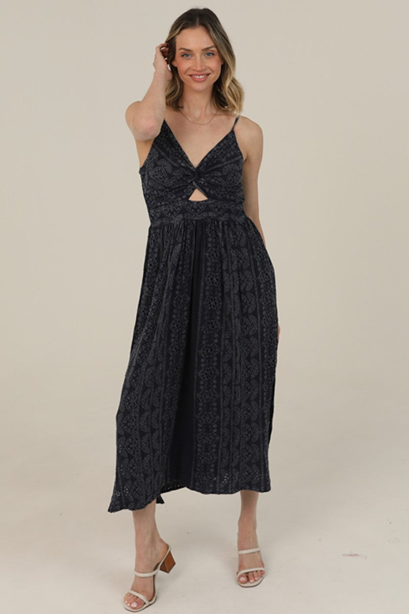  Midi Dress features a twist-front bodice, cutout detail, and eyelet embroidery 