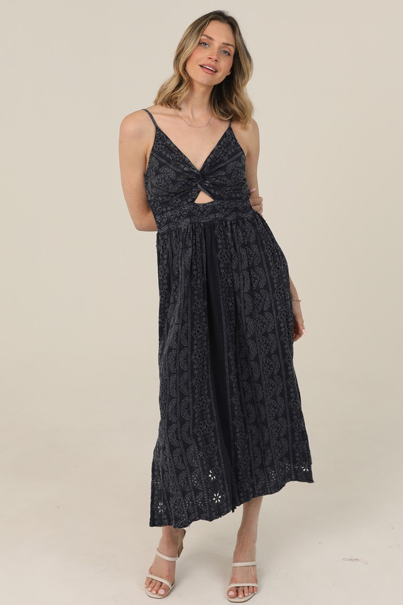  Midi Dress features a twist-front bodice, cutout detail, and eyelet embroidery 