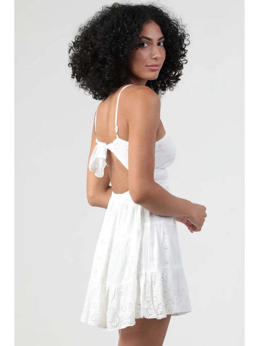 white mini fit & flare sundress with open tie-back and embroidered details