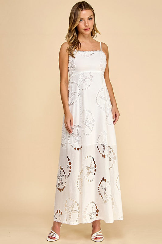 embroidered broderie cotton maxi dress with delicate lace trim and a flowing silhouette