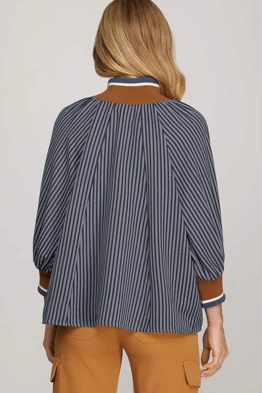The Lenora Striped Half-Zip Top blends sporty ease with timeless stripes and versatile ¾ sleeves.