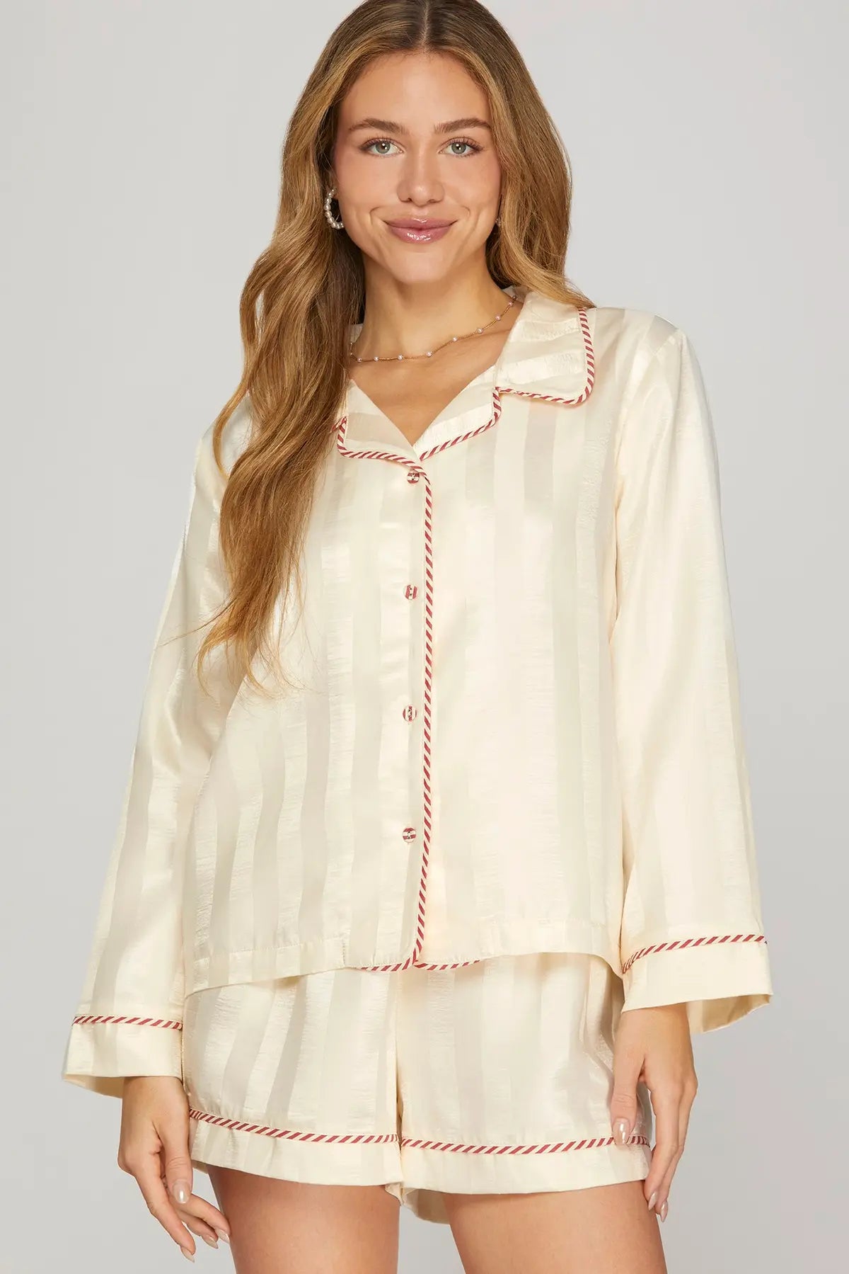 The Thalia Contrast Piped Pajama Set combines classic tailoring and silky comfort for effortlessly elegant lounging.