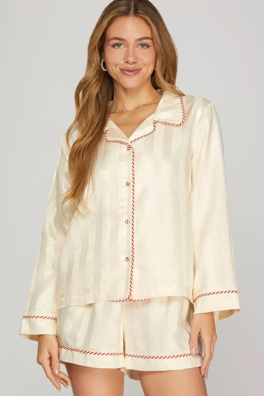 The Thalia Contrast Piped Pajama Set combines classic tailoring and silky comfort for effortlessly elegant lounging.