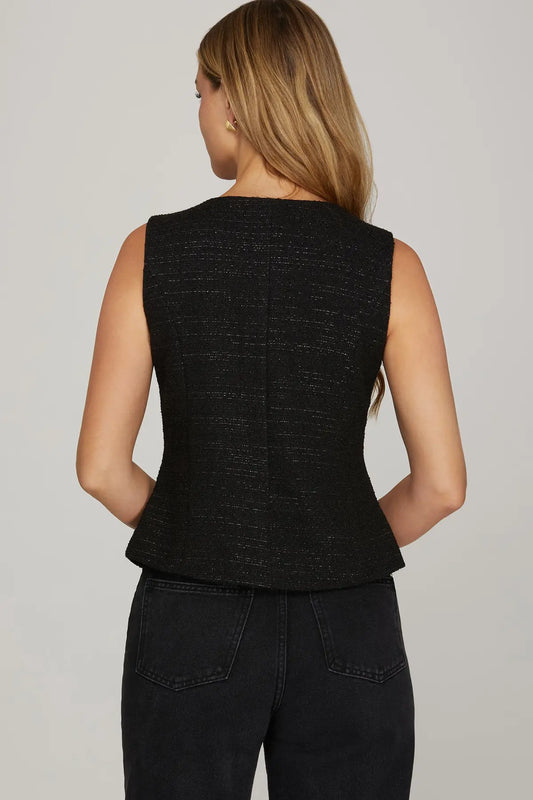 The Evadne Woven Tweed Vest offers timeless sophistication with a modern tailored edge.