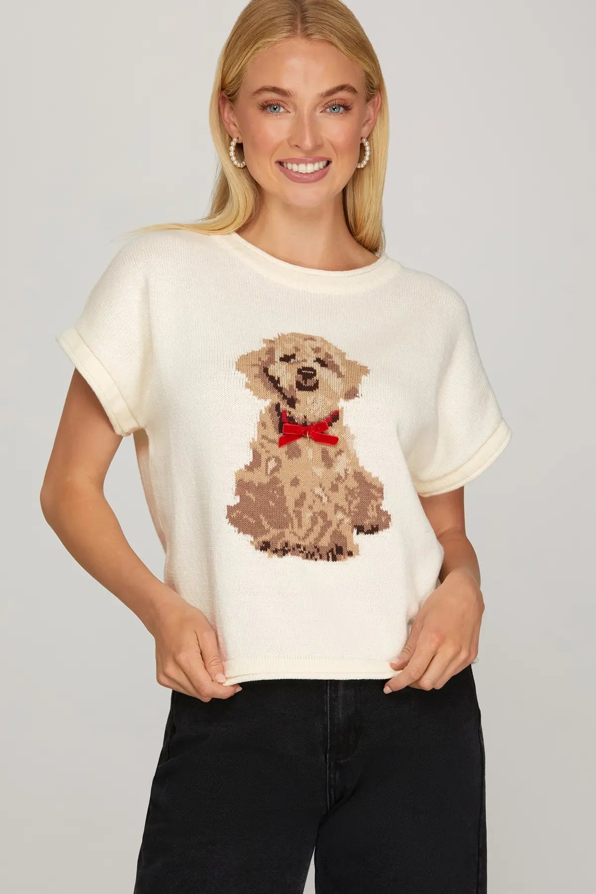 The Maribel Puppy Knit Sweater Top brings playful charm and cozy comfort together in a soft, relaxed silhouette.