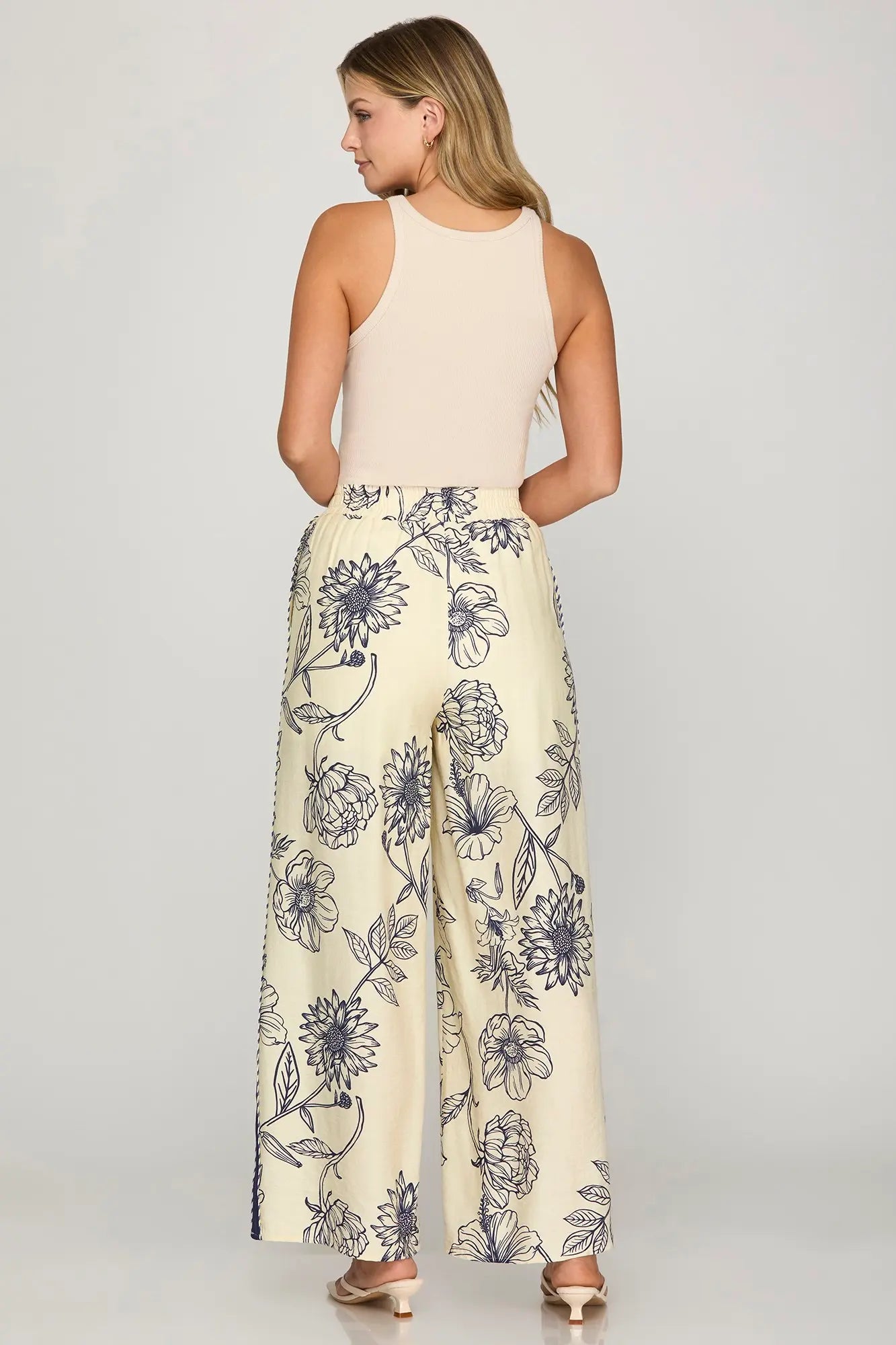 Woven print pants with contrast trim, elastic waistband, and pockets