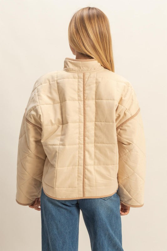 The Rowena Quilted Utility Jacket combines timeless structure with everyday function.