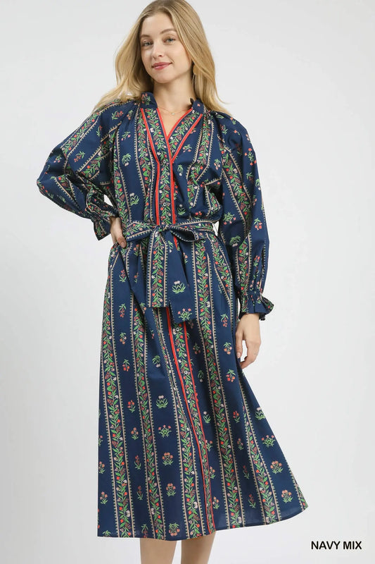A statement-making cotton maxi dress that blends bohemian charm with timeless sophistication.