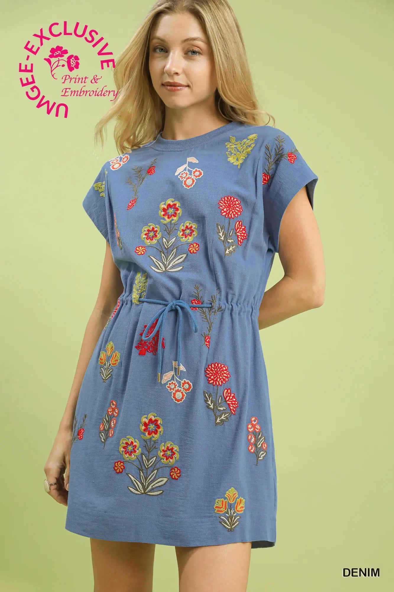 The Calista Embroidered Cotton Dress blends vibrant floral detailing with breezy comfort for effortless everyday elegance.