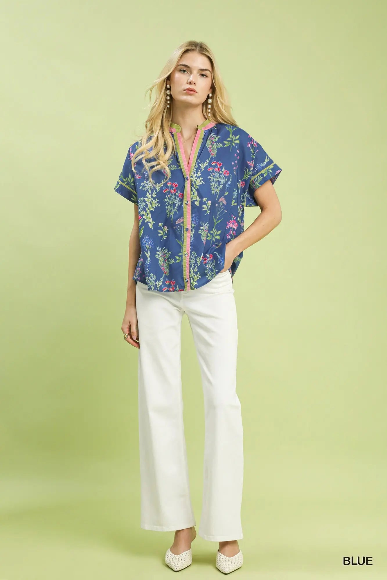 botanical floral blouse featuring contrast details and a classic button-front design