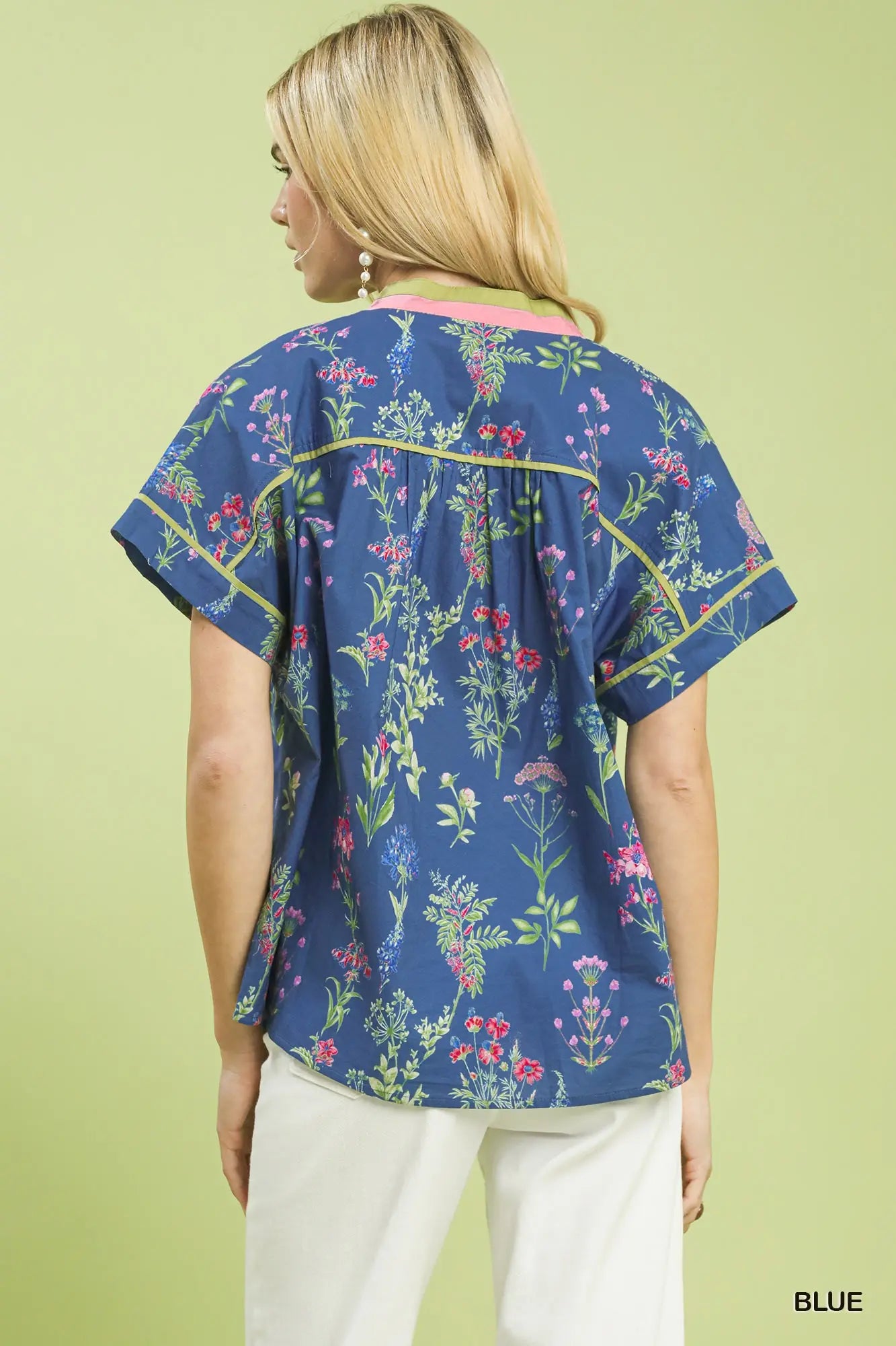 botanical floral blouse featuring contrast details and a classic button-front design