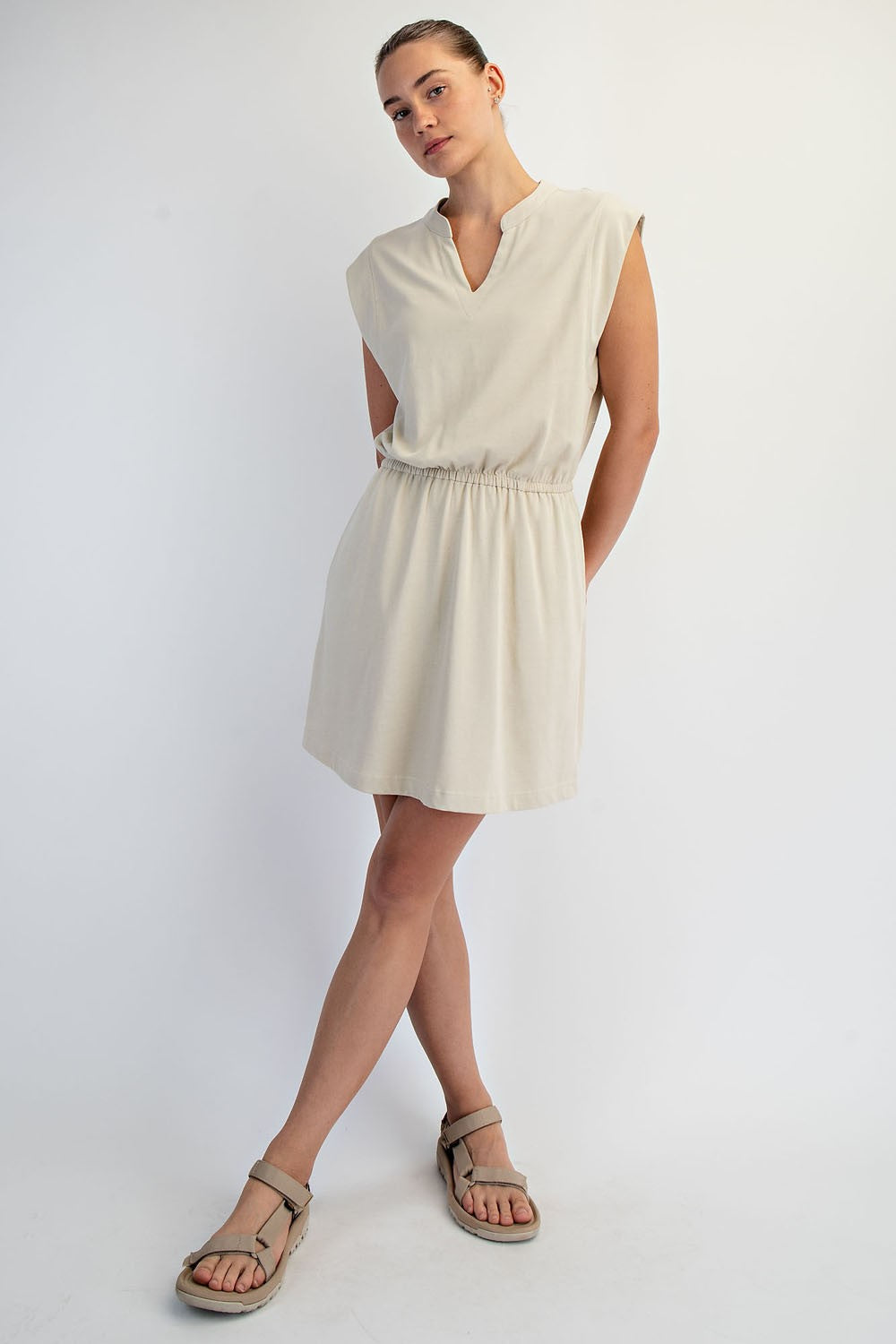 Mineral washed cotton sleeveless mini dress with cinched waist.
