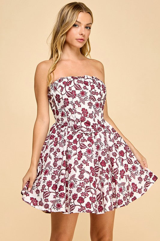 The Delphine Floral Corset Tube Dress combines romantic florals with a structured, figure-flattering silhouette.