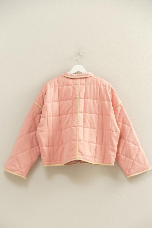 The Rowena Quilted Utility Jacket combines timeless structure with everyday function.