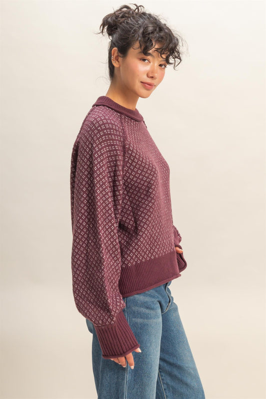 A cozy mock-neck sweater with a refined geometric pattern for effortless style.